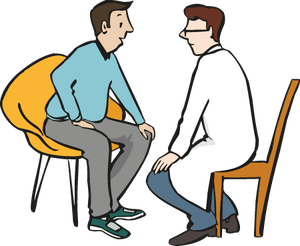 Ein Mann in einem langen, weißen Kittel sitzt einem anderen Mann in einem Stuhl gegenüber und hört aufmerksam zu, was dieser erzählt